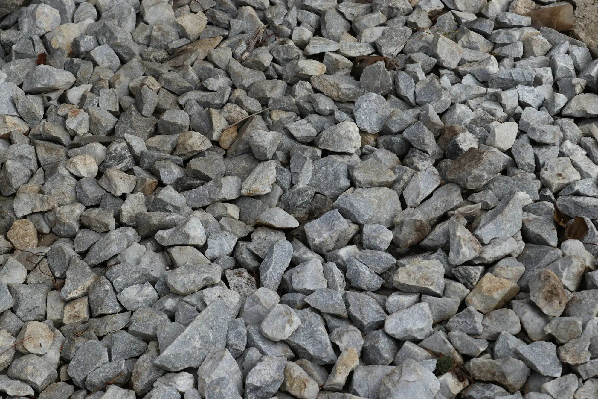 Close-up of grey angular crushed stone aggregate